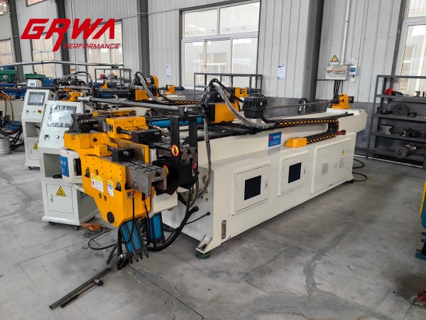 Finished pipe samples produced by 3D CNC tube bending machine, suitable for exhaust pipes and industrial tube fabrication.