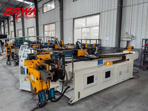Hydraulic tube bender used for precise exhaust pipe forming and automotive pipe bending applications.